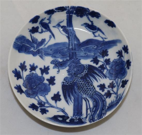 A Chinese blue and white phoenix and peony saucer dish, 19th century, 10.3cm